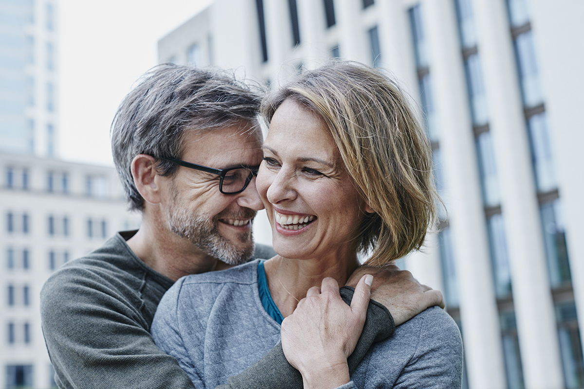 Happy mature couple hugging